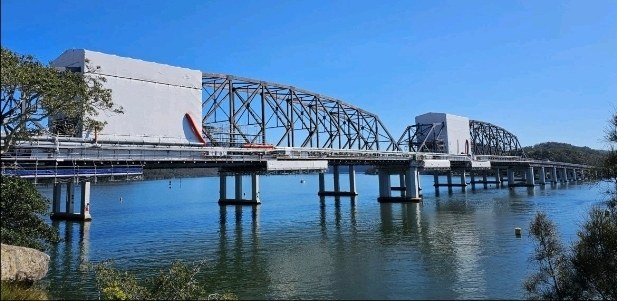 Elevation of the Peats Ferry Bridge showing containment enclosures positioned along the truss spans over the Hawkesbury River